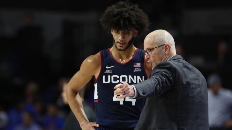 Dec 7, 2022; Gainesville, Florida, USA; Connecticut Huskies head coach Dan Hurley talks with guard Andre Jackson Jr. (44) during the second half at Exactech Arena at the Stephen C. O'Connell Center