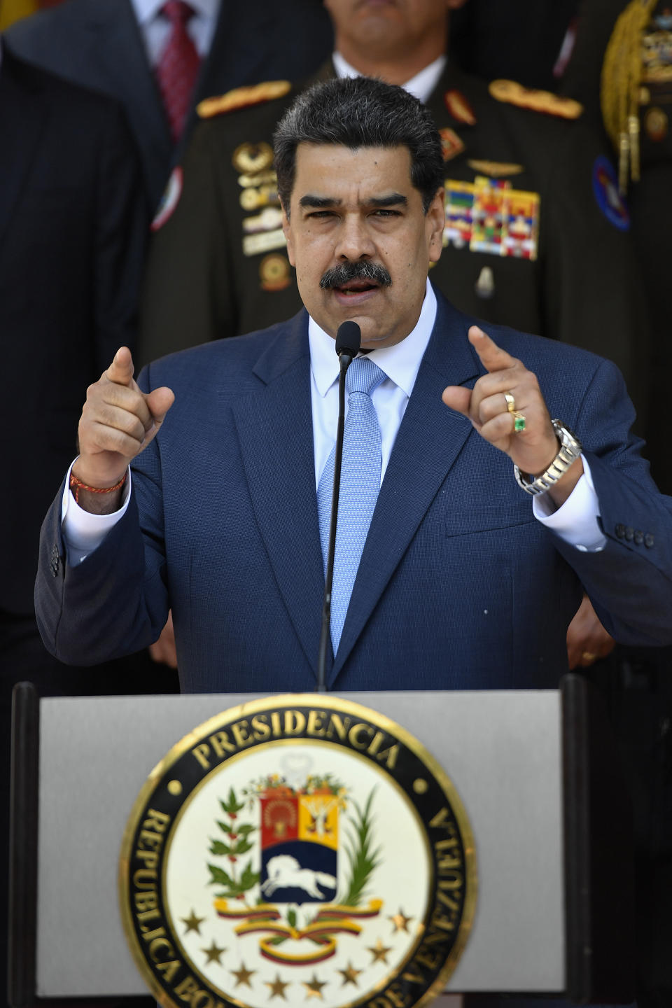 Venezuelan President Nicolas Maduro speaks at a press conference at the Miraflores Presidential Palace in Caracas, Venezuela, Thursday, March 12, 2020. Maduro has suspended flights to Europe and Colombia for a month, citing concerns for the new coronavirus. Maduro added in a national broadcast that the illness has not yet been detected in Venezuela, despite it being confirmed in each bordering country, including Colombia, Brazil and Guyana. (AP Photo/Matias Delacroix)