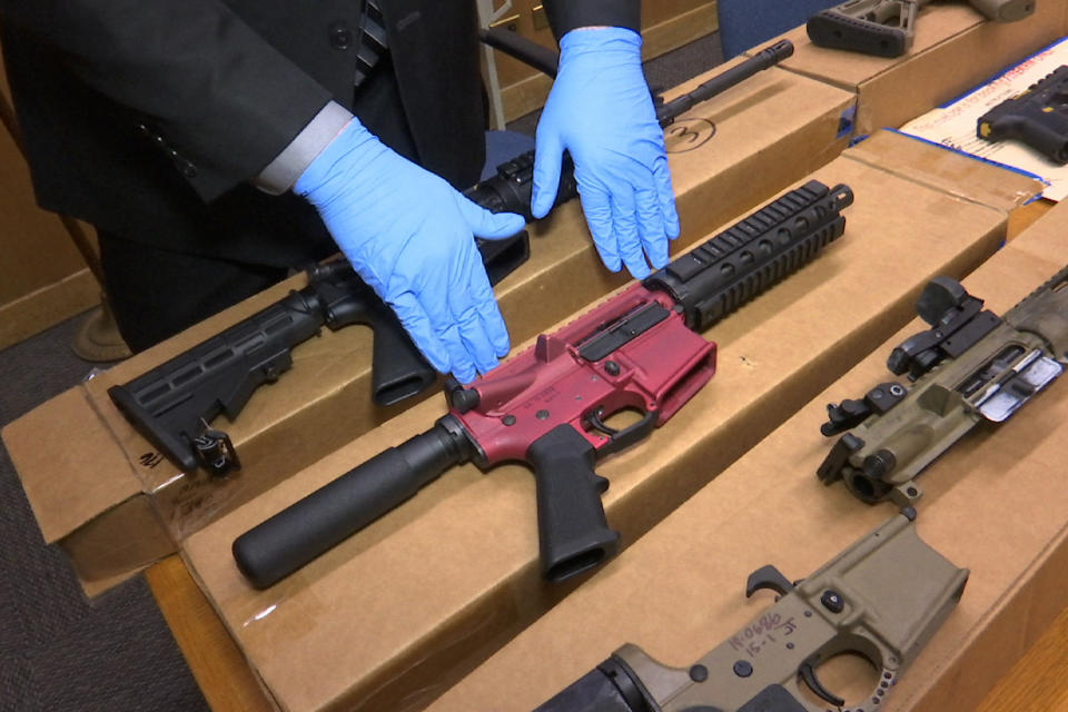 FILE - In this file photo taken Wednesday, Nov. 27, 2019, is Sgt. Matthew Elseth with "ghost guns" on display at the headquarters of the San Francisco Police Department in San Francisco. A federal appeals court in San Francisco has ruled that plans for 3D-printed, self-assembled "ghost guns" can be posted online without U.S. State Department approval. The San Francisco Chronicle says the 2-1 decision was made Tuesday, April 27, 2021, by the 9th U.S. District Court of Appeals. (AP Photo/Haven Daley,File)