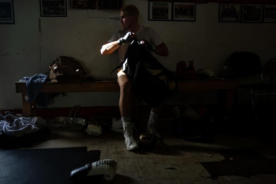 Jesus Delgado, 24, of Fort Walton Beach, searches his gym bag at Corpus Christi Police Officers Association Boxing Club on Tuesday, July 18, 2023, in Corpus Christi, Texas. 