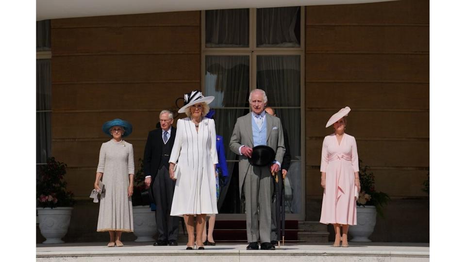 King Charles III and Queen Camilla, stand with the Duke and Duchess of Edinburgh (R) and the Duke and Duchess of Gloucester