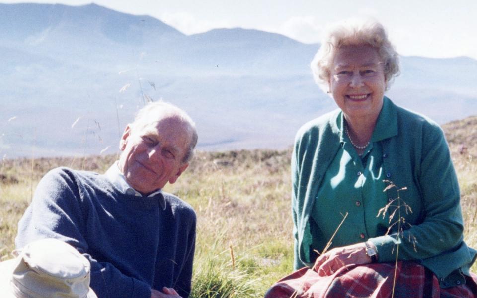 Handout image released by Buckingham Palace on 16/04/21 of a personal photograph of the Queen Elizabeth II and the Duke of Edinburgh at the top of the Coyles of Muick, taken by The Countess of Wessex in 2003. Issue date: Friday April 16, 2021. PA Photo. See PA story FUNERAL Philip. Photo credit should read: The Countess of Wessex via PA Wire NOTE TO EDITORS: This handout photo may only be used in for editorial reporting purposes for the contemporaneous illustration of events, things or the people in the image or facts mentioned in the caption. Reuse of the picture may require further permission from the copyright holder.  - The Countess of Wessex/PA Wire 