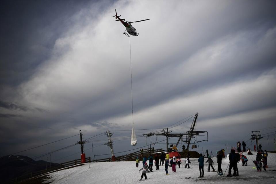 Snow being brought into Superbagneres | Anne-Christine POUJOULAT/Getty Images