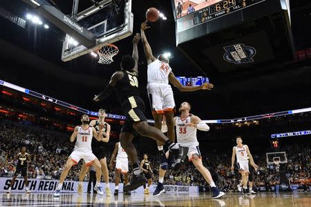 Mar 30, 2019; Louisville, KY, United States; Purdue Boilermakers forward Trevion Williams (50) blocks a shot by Virginia Cavaliers forward Mamadi Diakite (25) during the second half in the championship game of the south regional of the 2019 NCAA Tournament at KFC Yum Center. Mandatory Credit: Jamie Rhodes-USA TODAY Sports