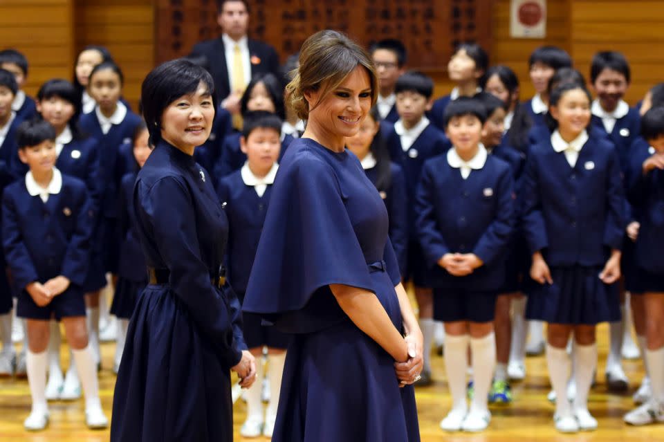 Both first ladies wore navy blue dresses. Photo: Getty