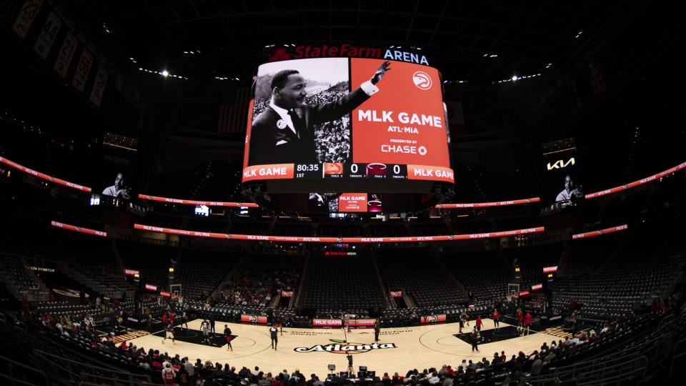 Martin Luther King Jr. is displayed on a screen before an NBA basketball game between the Atlanta Hawks and the Miami Heat, Monday, Jan. 16, 2023, in Atlanta. (AP Photo/Hakim Wright Sr.)