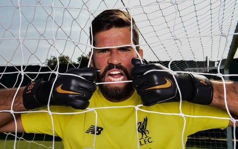 Alisson looks raring to go - Alisson looks raring to go in his hope to be worth the £65 million Liverpool paid for him - Credit: Getty Images