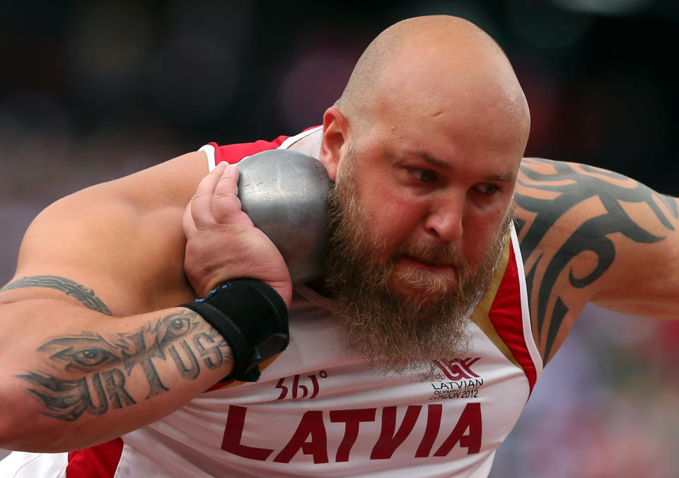 LONDON, ENGLAND - AUGUST 03: Maris Urtans of Latvia competes in the Men's Shot Put qualification on Day 7 of the London 2012 Olympic Games at Olympic Stadium on August 3, 2012 in London, England. (Photo by Alexander Hassenstein/Getty Images