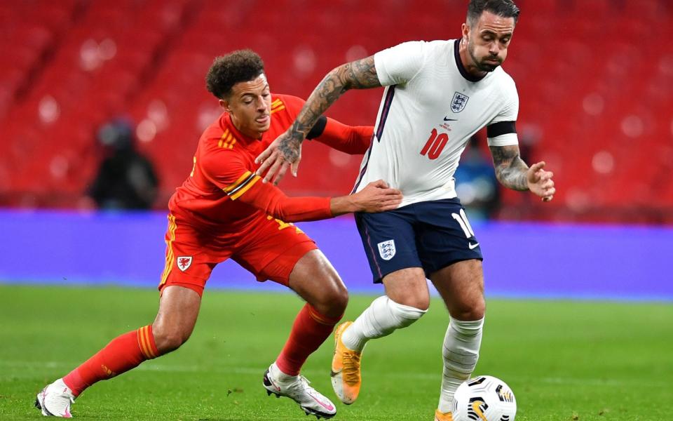 Danny Ings (R) of England in action against Ethan Ampadu (L) of Wales during the international friendly soccer match - Shutterstock