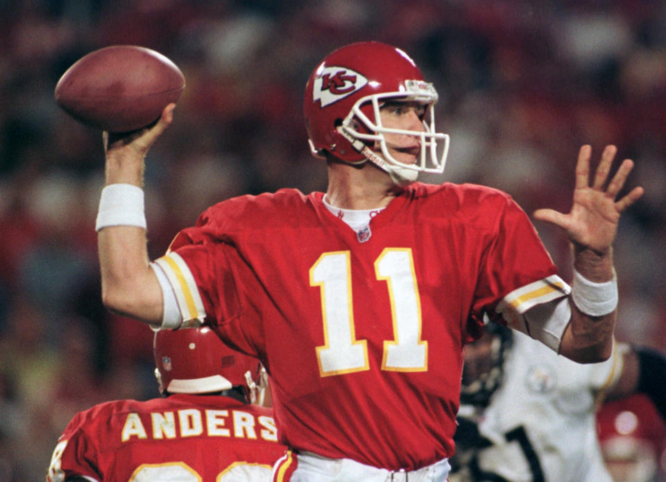 FILE - In this Oct. 26, 1998, file photo, Kansas City Chiefs quarterback Elvis Grbac throws against the Pittsburgh Steelers during the second quarter in Kansas City, Mo. Grbac signed with the Chiefs in 1997 for the chance to be the starter. He started the first nine games that season before getting hurt, but helped Kansas City win the AFC West. Grbac returned for the season finale and then lost the playoff opener at home to Denver. (AP Photo/Ed Zurga, File)
