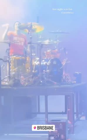 <p>Kourtney Kardashian/Instagram</p> Travis Barker performs onstage during Blink-182's concert in Brisbane