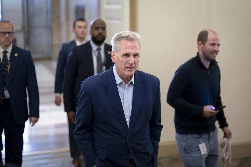 Speaker of the House Kevin McCarthy, R-Calif., talks to reporters about the debt limit negotiations as he arrives at the Capitol in Washington, Friday, May 26, 2023. McCarthy says the mediators "made progress" on a deal with the White House to raise the debt limit and cut federal spending, as they race for agreement this weekend. (AP Photo/J. Scott Applewhite)