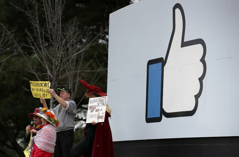 Protesters with the group "Raging Grannies" demonstrated outside of Facebook headquarters on April 5, 2018 calling for better consumer protection and online privacy in the wake of Cambridge Analytica's hijacking of personal user data