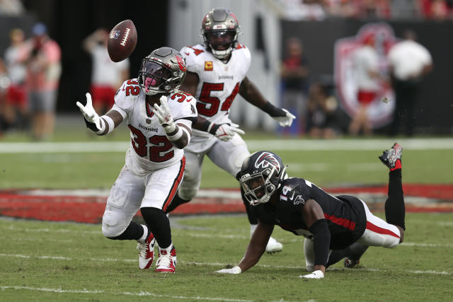 Tampa Bay Buccaneers safety Mike Edwards (32) runs to the ball as