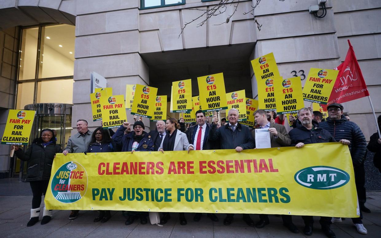 Railway cleaners stage a protest outside the Transport Department (DfT), London, calling for an end to poverty pay - Yui Mok/PA Wire