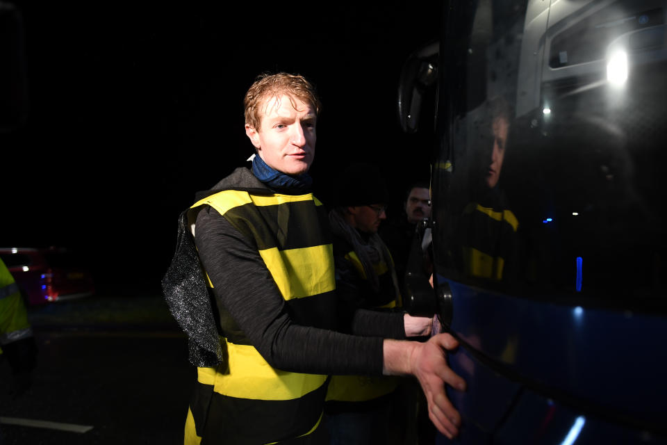 Extinction Rebellion protesters dressed as bees glue themselves to the Conservative Party campaign bus as Prime Minister Boris Johnson visits the JCB cab manufacturing centre in Uttoxeter, while on the General Election campaign trail.