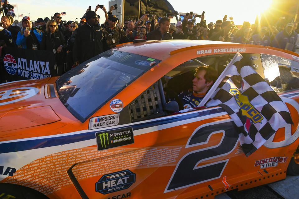 Brad Keselowski drives into Victory Lane after winning a Monster Energy NASCAR Cup Series auto race at Atlanta Motor Speedway, Sunday, Feb. 24, 2019, in Hampton, Ga. (AP Photo/John Amis)