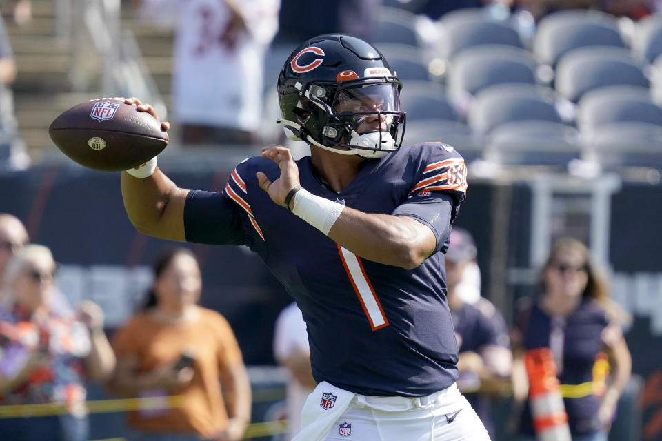 Chicago Bears quarterback Justin Fields warms up before an NFL football game against the against the Cincinnati Bengals Sunday, Sept. 19, 2021, in Chicago. (AP Photo/Nam Y. Huh)