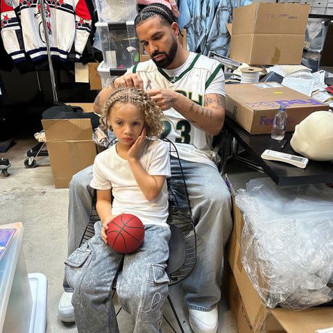 <p>Drake/Instagram</p> Drake braiding Adonis' hair