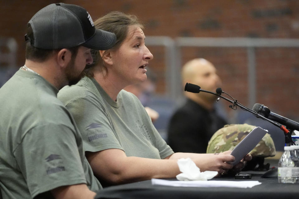 Nicole Herling, sister of shooter Robert Card, testifies, Thursday, May 16, 2024, in Augusta, Maine, during a hearing of the independent commission investigating the law enforcement response to the mass shooting in Lewiston, Maine. (AP Photo/Robert F. Bukaty)