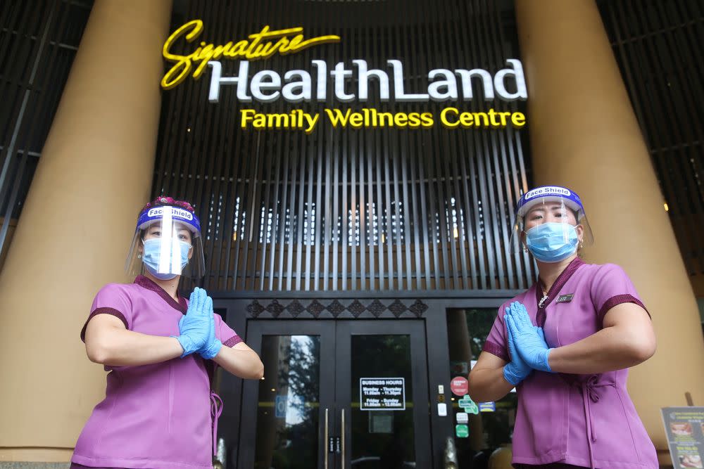 Therapists decked in protectice gear are pictured at the Healthland Wellness Centre in Sunway Pyramid June 30, 2020. — Picture by Choo Choy May