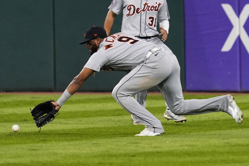 Detroit Tigers right fielder Willi Castro cannot make a play on a two-run single by Chicago White Sox's Andrew Vaughn during the seventh inning of a baseball game in Chicago, Friday, Aug. 12, 2022. (AP Photo/Nam Y. Huh)