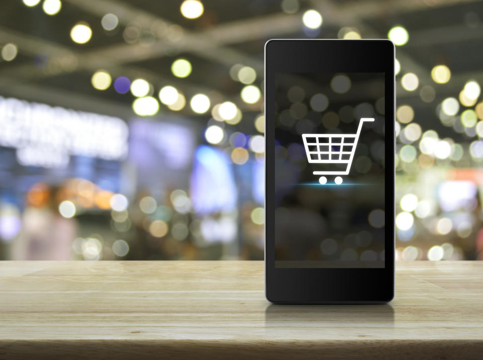 A shopping cart icon displayed on a smartphone