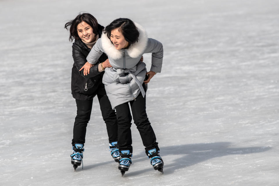 North Korean women skate at an ice rink at Masikryong Ski Resort on Feb. 5, near Wonsan, North Korea.