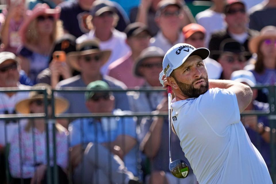 Feb 10, 2022; Scottsdale, AZ, USA;  Jon Rahm hits from the 1st tee box during Round 1 of the WM Phoenix Open at TPC Scottsdale. Mandatory Credit: Cheryl Evans-Arizona Republic