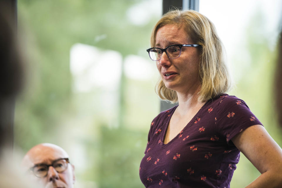 Dr. Brie Folkner cries while speaking&nbsp;to the panelists about one of her patients.