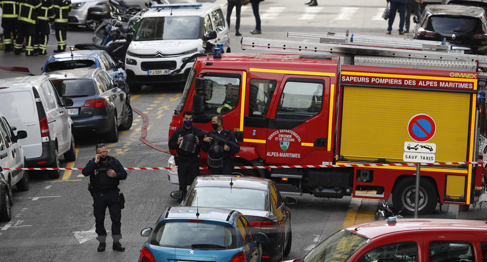 French police officers secure the street near the entrance of the Notre Dame Basilica church in Nice after a suspected terror attack.