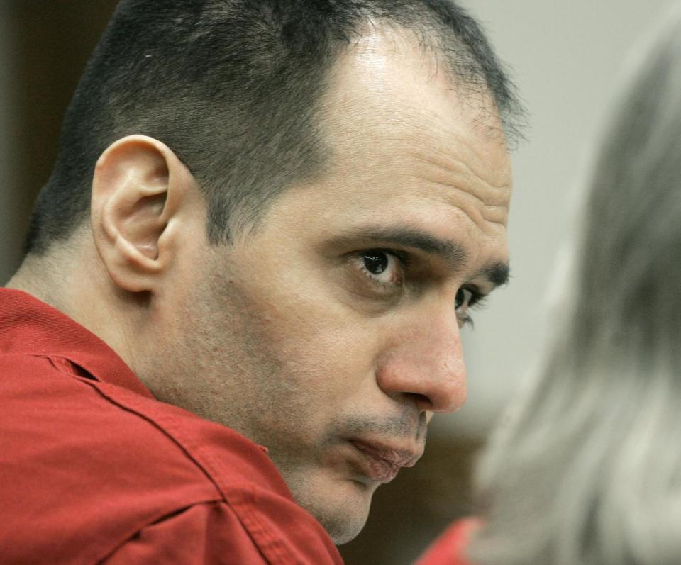 FILE - In this Tuesday, Jan. 9, 2007, file photo, death row inmate Juan Carlos Chavez is shown during the first day of hearings at a Miami-Dade County courtroom in Miami. Chavez is scheduled for execution by lethal injection at 6 p.m. Wednesday Feb. 12, 2014 at Florida State Prison in Starke, Fla. (AP Photo/Alan Diaz, File)