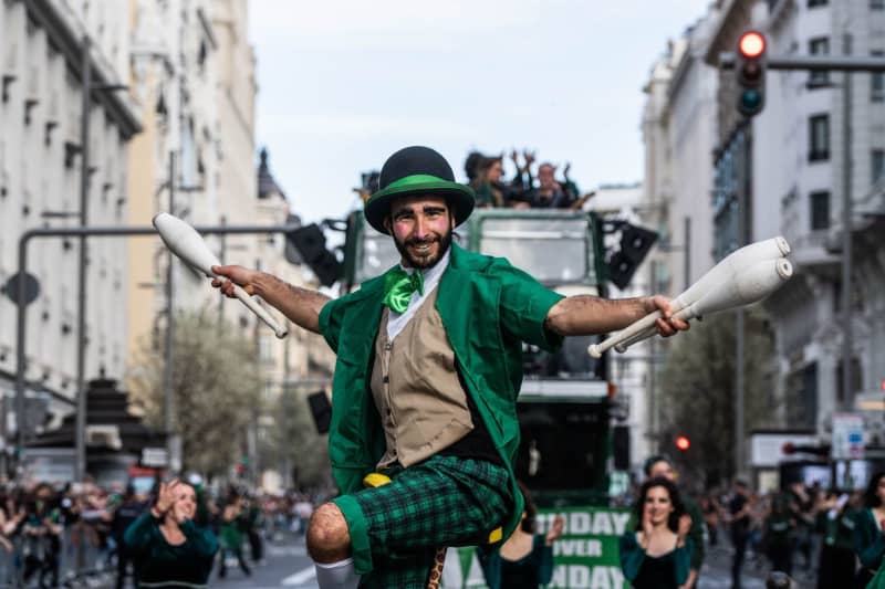 A person with costumes takes part in the parade for St. Patrick's Day, a traditional Irish holiday, through the streets of Madrid. Matias Chiofalo/EUROPA PRESS/dpa