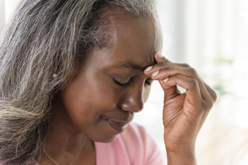 Mature woman with headache