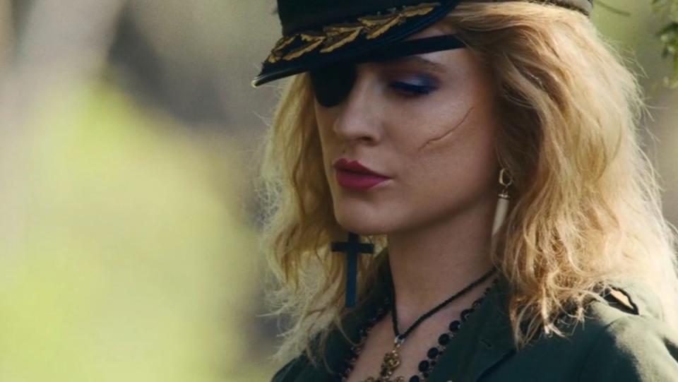 Evan Rachel Wood with a scar and eyepatch as Madonna in Weird