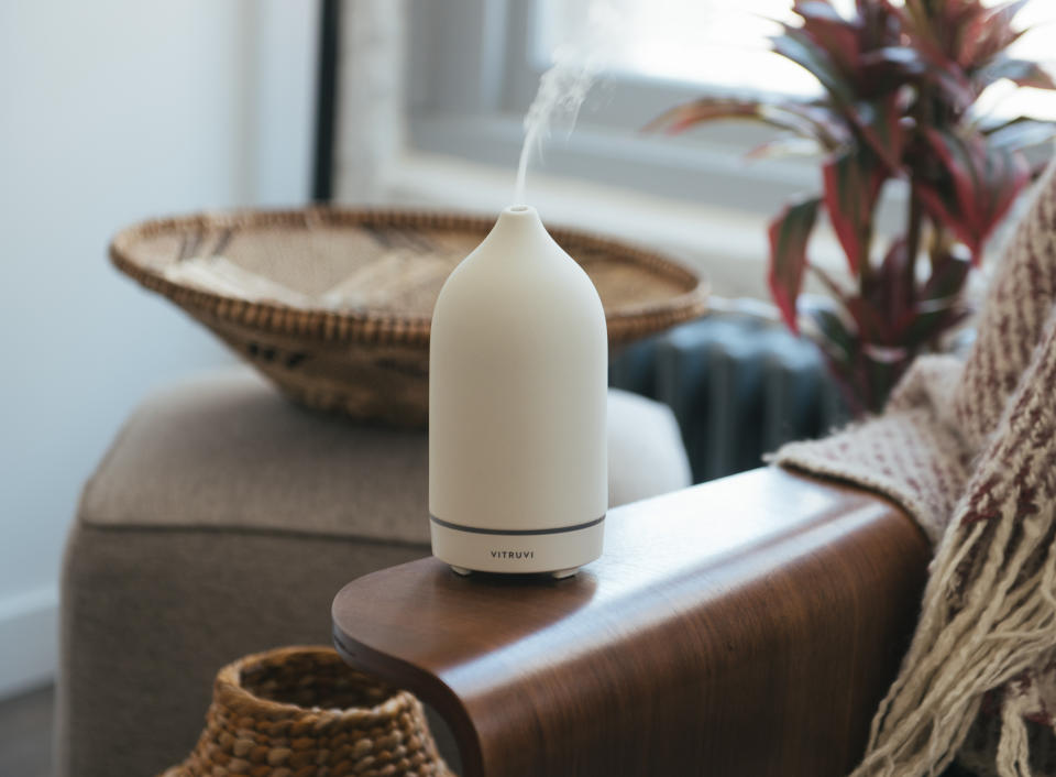 <p>The sleek ceramic dispenser of essential oils goes a long way toward creating a peaceful home environment, and looks great on a coffee table. (The company offers an array of essential oils as well, including seasonally appropriate varieties like frankincense and peppermint.) $119, <a rel="nofollow noopener" href="https://vitruvi.com/" target="_blank" data-ylk="slk:vitruvi.com;elm:context_link;itc:0;sec:content-canvas" class="link ">vitruvi.com</a> </p>