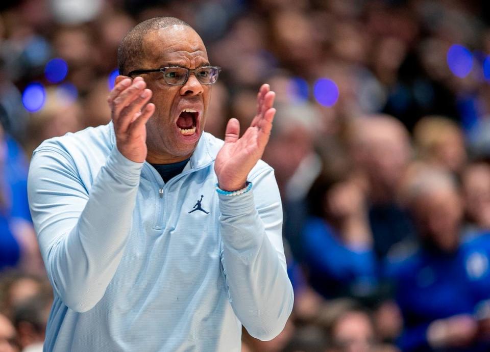 North Carolina coach Hubert Davis directs his team defense in the first half against Duke on Saturday, February 4, 2023 at Cameron Indoor Stadium in Durham, N.C.