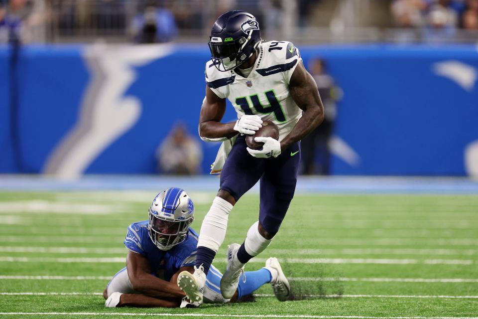 Seahawks wide receiver DK Metcalf runs with the ball during the second quarter of the Lions' 48-45 loss on Sunday, Oct. 2, 2022, at Ford Field.