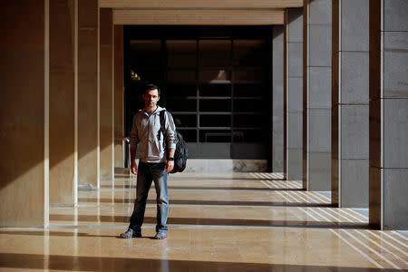Iranian student Mani Razaeirad poses at the Universitat Politecnica de Catalunya (UPC) in Barcelona, Spain, October 26, 2018. Picture taken October 26, 2018. REUTERS/Albert Gea