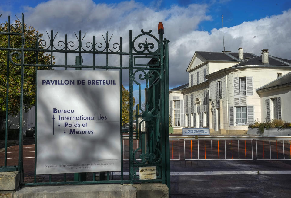 The entrance of the International Bureau of Weights and Measures is pictured in Sevres, outside Paris, Thursday, Nov. 17, 2022. Officials from 64 member states are convening at a conference organized by the supreme authority of the International Bureau of Weights and Measures (BIPM) and scientists have expanded the world's unit systems the first time this century — as the global population surges past 8 billion. (AP Photo/Michel Euler)