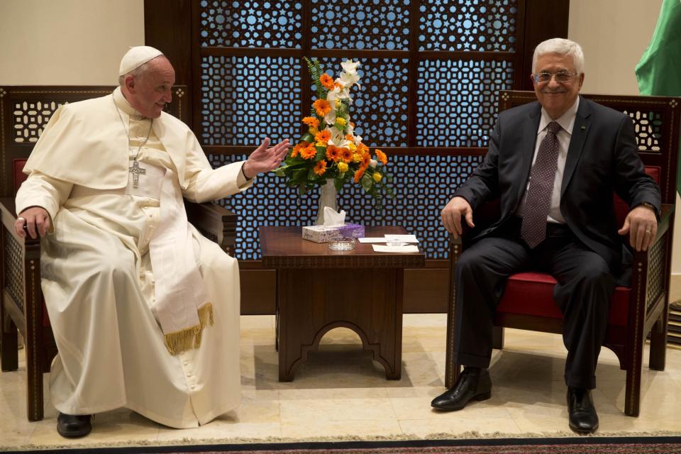 Pope Francis gestures during a meeting with Palestinian president Mahmoud Abbas in the West Bank town of Bethlehem