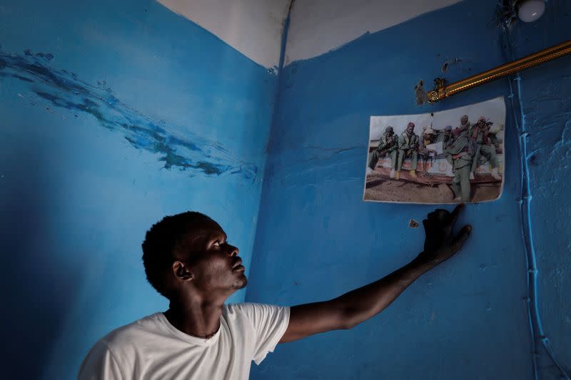 The Wider Image: African migrant disaster survivor haunted by weeks lost at sea