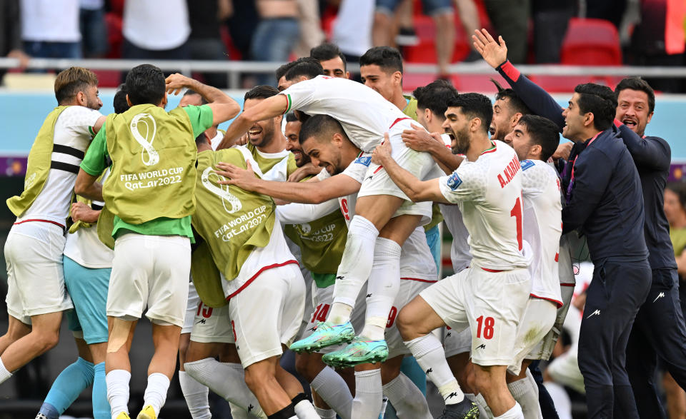 AL-RAYYAN, QATAR - NOVEMBER 25: Players of Iran celebrate after a goal during FIFA World Cup Qatar 2022 Group B match between Wales and Iran at Ahmed bin Ali Stadium in Al-Rayyan, Qatar on November 25, 2022. (Photo by Mustafa Yalcin/Anadolu Agency via Getty Images)