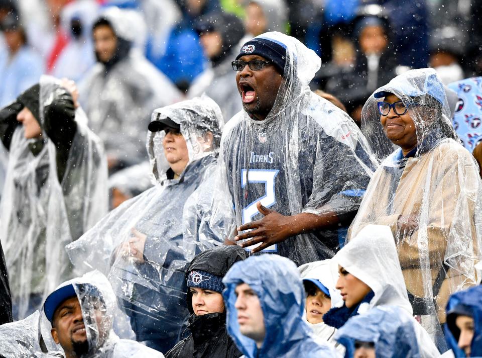 Titans fans react to the game as their team trails the Texans during the second quarter at Nissan Stadium Sunday, Nov. 21, 2021 in Nashville, Tenn. 