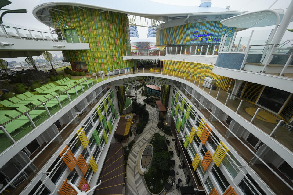 An area of rooms and shops dubbed Central Park is seen from an upper deck aboard Icon of the Seas, the world's largest cruise ship, during a media day preview as it prepares for its inaugural public voyage later this month, Thursday, Jan. 11, 2024, at PortMiami in Miami. / Credit: Rebecca Blackwell / AP