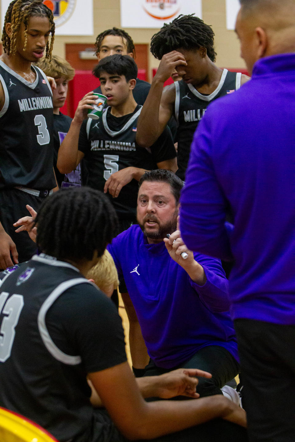 Head coach Ty Amundsen for Millennium basketball talks to his team at Chaparral High School basketball gym in Scottsdale on Nov. 30, 2023. Sam Ballesteros/The Republic