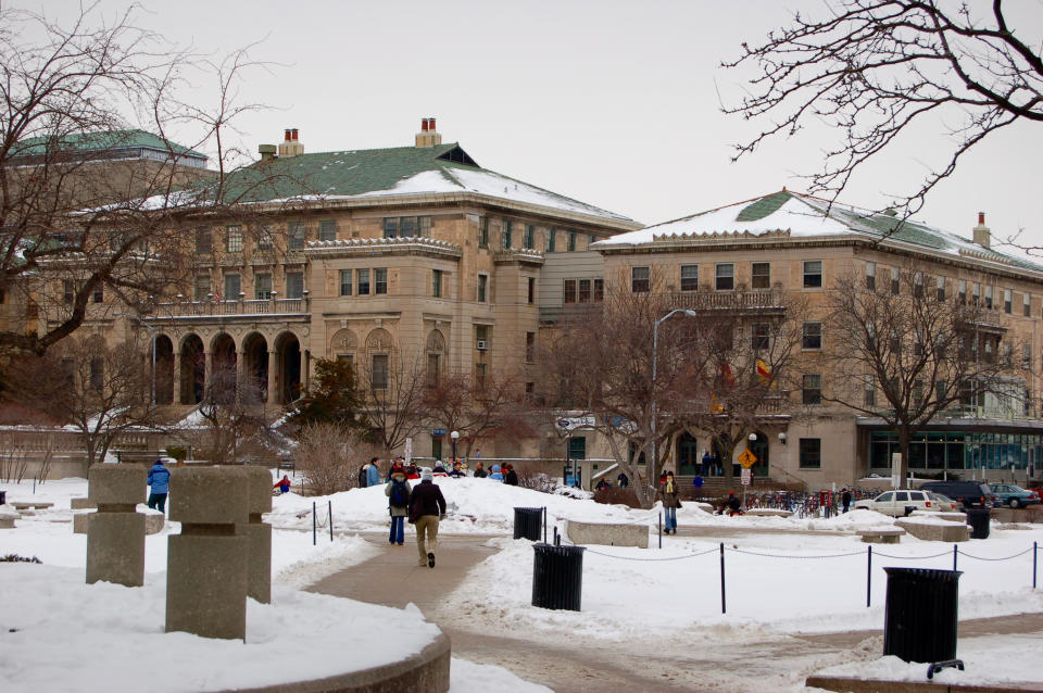 Madison, USA - December 12, 2005: Frozen square at Winter Madison University of Wisconsin with students walking