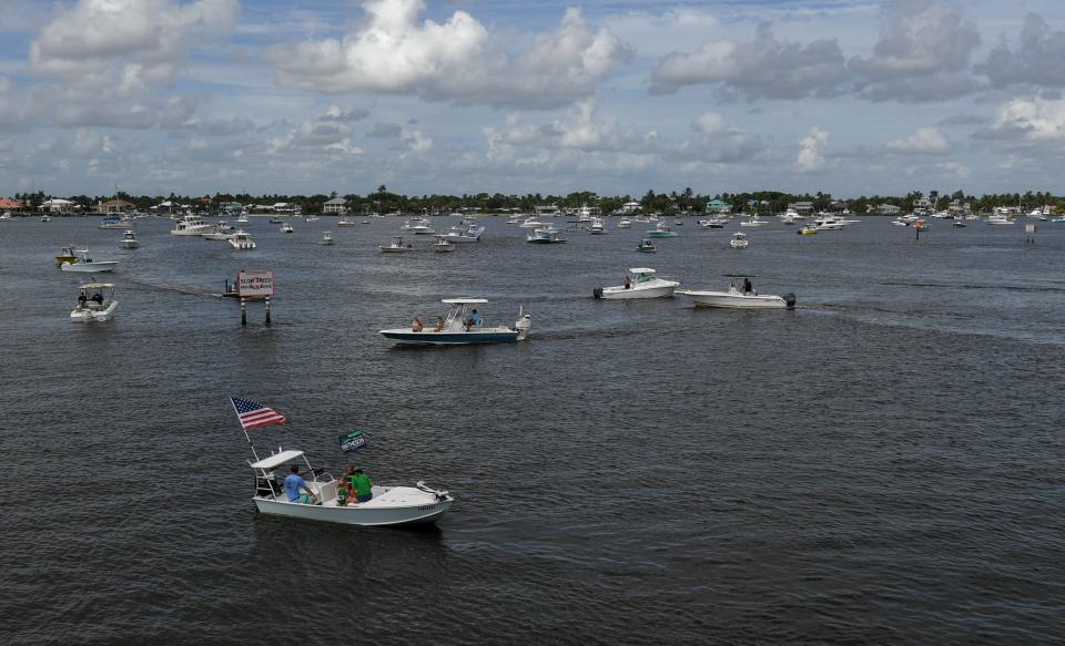 Boaters begin to gather on the west side of the Old Roosevelt Bridge in the St. Lucie River on Monday, July 25, 2022, in preperation for a protest against long bridge closures of the railroad bridge for Brightline train traffic. 
