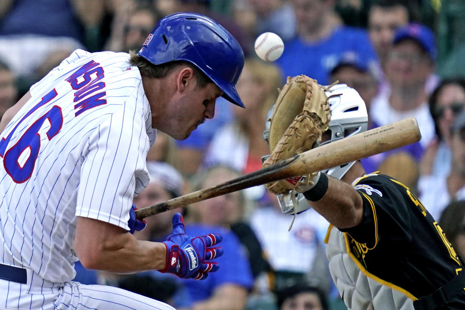 Chicago Cubs' Patrick Wisdom, left, is hit by a pitch from Pittsburgh Pirates relief pitcher Shea Spitzbarth during the sixth inning of a baseball game in Chicago, Sunday, Sept. 5, 2021. (AP Photo/Nam Y. Huh)