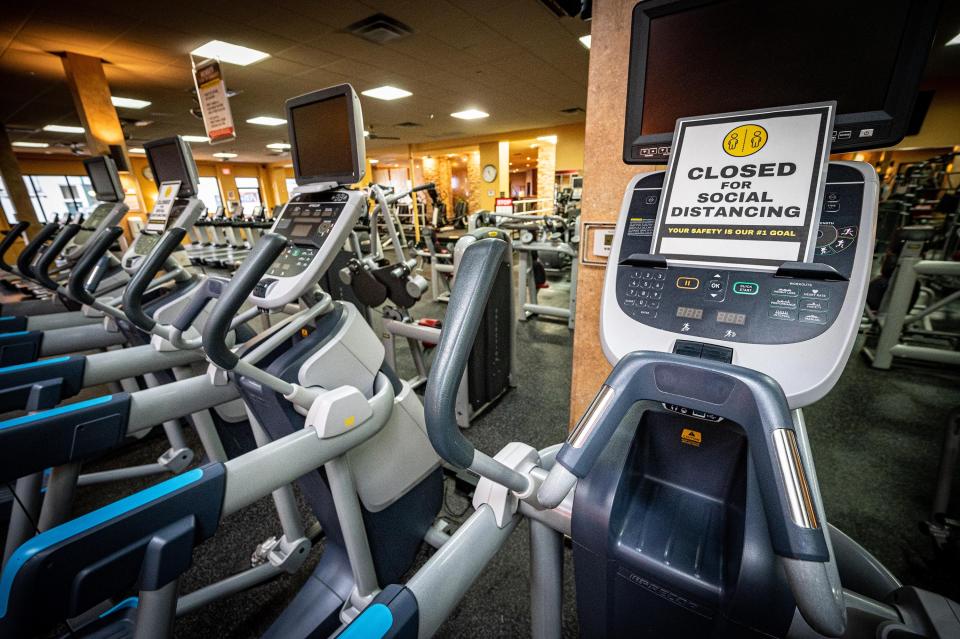 Social distancing signs on machines at Gold's Gym in East Northport, New York, on Aug. 19, 2020, ahead of reopening after the coronavirus shutdown. (Photo: J. Conrad Williams Jr./Newsday via Getty Images)